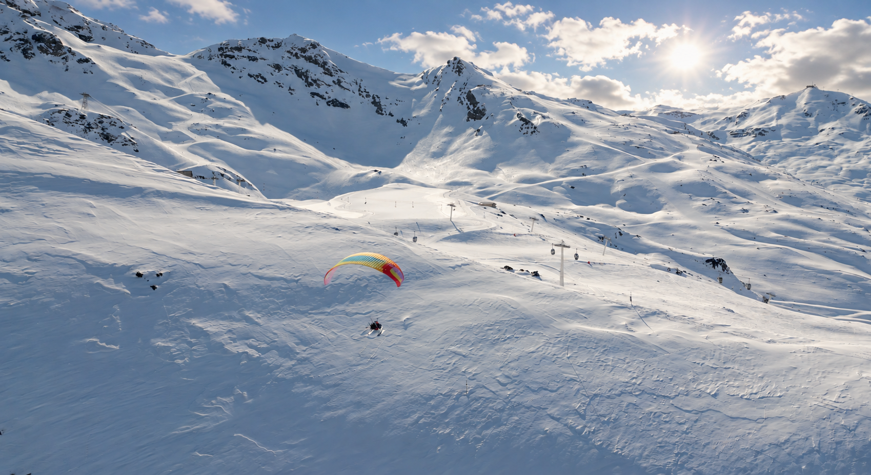 Paramotor over alpine lake